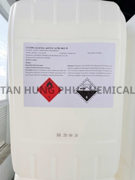 Glacial acetic acid GAA packaged in 30kg carboys at Tan Hung Phu warehouse HCMC